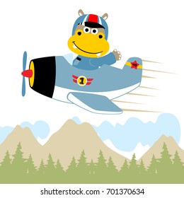 vector cartoon of funny hippo pilot on airplane flying across mountains
