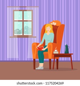 Vector cartoon girl reading book in armchair. Cat sleeping on the back of chair. Illustration flat young woman in cosy interior: window with winter landscape background, table with coffee mug, teapot.