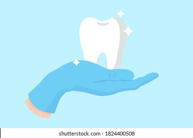 Vector cartoon hand of a dentist in a blue glove that hold a white, healthy, shiny tooth. Dental concept.