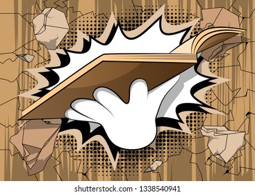 Vector cartoon hand holding a book. Illustrated hand on comic book background.