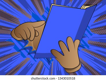 Vector cartoon hand holding and pointing at an opened book. Illustrated hand on comic book background.