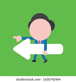Vector cartoon illustration concept of faceless businessman mascot character walking, holding left arrow and pointing on green background.