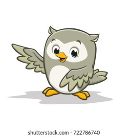 Vector cartoon illustration of a cute happy baby owl