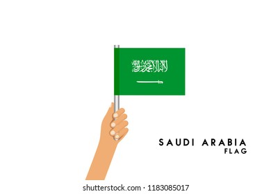 Vector cartoon illustration of human hands hold Saudi Arabia flag. Isolated object on white background.