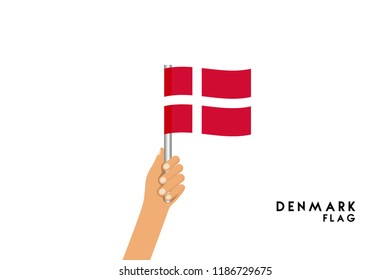 Vector cartoon illustration of human hands hold Denmark flag. Isolated object on white background.