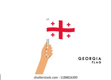 Vector cartoon illustration of human hands hold georgia flag. Isolated object on white background.