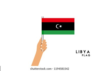Vector cartoon illustration of human hands hold Libya flag. Isolated object on white background.