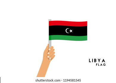 Vector cartoon illustration of human hands hold Libya flag. Isolated object on white background.