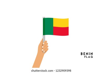 Vector cartoon illustration of human hands hold Benin flag. Isolated object on white background.