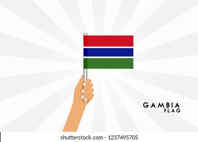Vector cartoon illustration of human hands hold Gambia flag. Isolated object on white background.