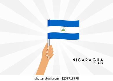 Vector cartoon illustration of human hands hold Nicaragua flag. Isolated object on white background.