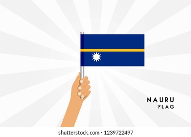 Vector cartoon illustration of human hands hold Nauru flag. Isolated object on white background.