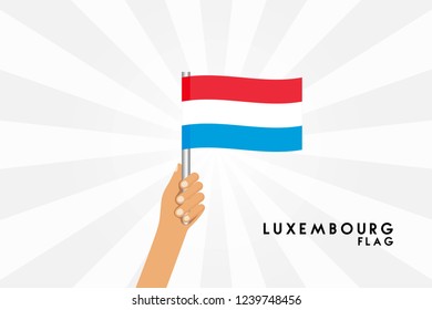 Vector cartoon illustration of human hands hold Luxembourg flag. Isolated object on white background.