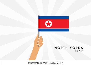 Vector cartoon illustration of human hands hold North Korea flag. Isolated object on white background.