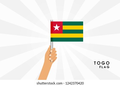 Vector cartoon illustration of human hands hold Togo flag. Isolated object on white background.