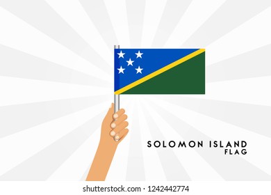 Vector cartoon illustration of human hands hold Solomon island flag. Isolated object on white background.