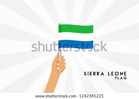 Vector cartoon illustration of human hands hold Sierra Leone flag. Isolated object on white background.