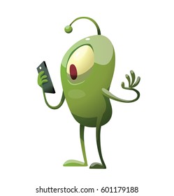 Vector cartoon image of a funny green microbe with one big eye, with an antenna, with arms and legs, standing with a smartphone in his hand on a white background. Positive character. Creature. 