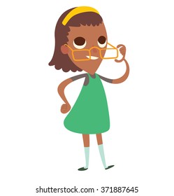 Vector cartoon image of a funny little black girl in glasses with brown wavy hair in green-gray dress with an orange rim in her hair, standing and smiling on a white background. Vector illustration.
