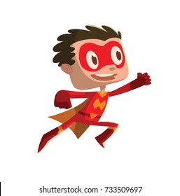 Vector cartoon image of a funny little boy in a red superhero costume with a yellow cloak flying and smiling on a white background. Positive character, children, halloween, holiday. 