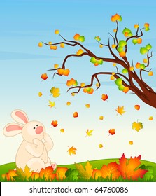 Vector cartoon little toy bunny with autumnal leaves
