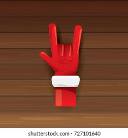 vector cartoon Santa Claus hand rock n roll icon on wooden background. Christmas Rock n roll concert or hipster party poster design template