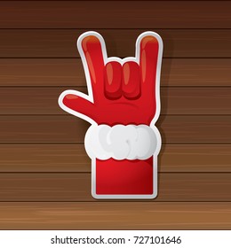vector cartoon Santa Claus hand rock n roll icon on wooden background. Christmas Rock n roll concert or hipster party poster design template