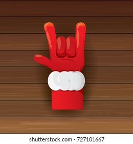 vector cartoon Santa Claus hand rock n roll icon on wooden background. Christmas Rock n roll concert or hipster party poster design template