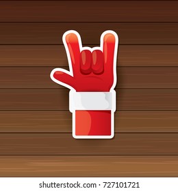 vector cartoon Santa Claus hand rock n roll icon on wooden background. Christmas Rock n roll concert or hipster party poster design template