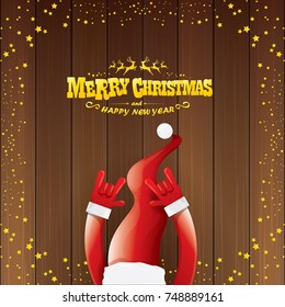vector cartoon Santa Claus rock n roll style with golden calligraphic greeting text on wooden background with christmas star lights. Merry Christmas Rock n roll party poster design or greeting card. 