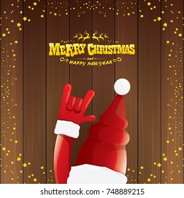 vector cartoon Santa Claus rock n roll style with golden calligraphic greeting text on wooden background with christmas star lights. Merry Christmas Rock n roll party poster design or greeting card. 
