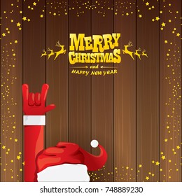 vector cartoon Santa Claus rock n roll style with golden calligraphic greeting text on wooden background with christmas star lights. Merry Christmas Rock n roll party poster design or greeting card. 