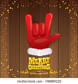 vector cartoon Santa Claus rock n roll style with golden calligraphic greeting text on wooden background with christmas star lights. Merry Christmas Rock n roll party poster design or greeting card. 