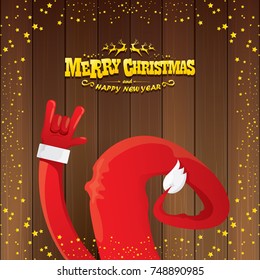 vector cartoon Santa Claus rock n roll style with golden calligraphic greeting text on wooden background with christmas star lights. Merry Christmas Rock n roll party poster design or greeting card. 