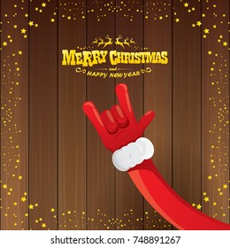 vector cartoon Santa Claus rock n roll style with golden calligraphic greeting text on wooden background with christmas star lights. Merry Christmas Rock n roll party poster design or greeting card. 