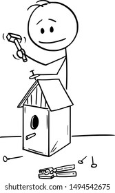 Vector Cartoon Stick Figure Drawing Conceptual Illustration Of Man Building Birdhouse For Birds With Hand Tools Like Hammer And Nails In Workshop.