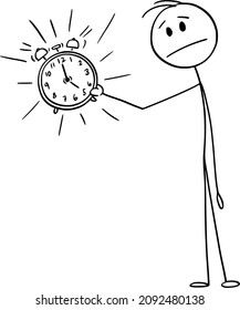 Vector cartoon stick figure drawing conceptual illustration of unhappy frustrated man or businessman holding ringing alarm clock. Concept of wake up, deadline or time management.