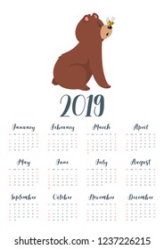Vector cartoon style illustration of 2019 year calendar with brown grizzly bear, sitting in amusement and watching a bee sitting on the nose. Template for print. One page Calendar. Vertical layout.