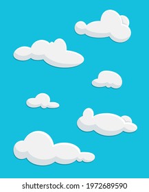 Vector cartoon white fluffy clouds isolated on a blue background