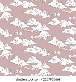 Vector celestial seamless pattern with oriental clouds. Pastel hand drawn cozy textile or magic wrapping design