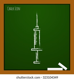 Vector chalk drawn doodle syringe icon on school board 