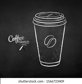 Vector chalk drawn illustration of coffee paper cup in black and white colors on chalkboard background.