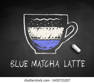Vector chalk drawn sketch of Blue Matcha Latte with piece of chalk on chalkboard background.