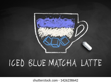 Vector chalk drawn sketch of iced Blue Matcha Latte on chalkboard background with piece of chalk.