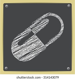 Vector chalk drawn sketch of pill icon on school blackboard  