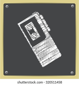 Vector chalk drawn in sketch style retro dictaphone icon on school blackboard 
