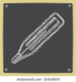 Vector chalk drawn sketch of thermometer icon on school blackboard  