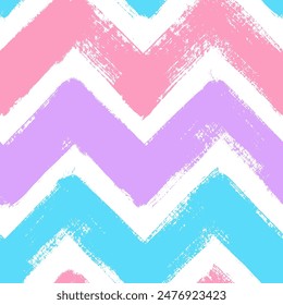 Vector chevron seamless pattern. Colorful brush stroke background. Zigzag print in pink, purple, blue colors. Unusual painted ornament for kids. 