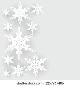 Vector of Christma background with cut paper snowflakes and space for text.New Year design