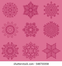 Vector christmas abstract pink background with falling snowflakes. Set of 9 snowflakes.
